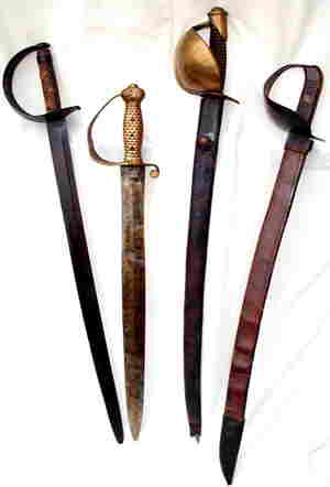 Four Naval Cutlasses