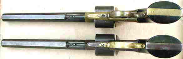 BOTTOM VIEW OF BOTH REVOLVERS